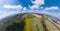 Aerial view of agricultural fields of different color crop under