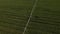 Aerial view of agricultural irrigation system watering corn field