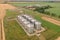 Aerial view of agricultural land and grain silo