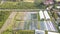 Aerial view of Agricultural plots, Allotment plot in Spring, prepared for planting. An allotment is a plot of land rented and use