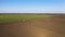 Aerial view of the agriculture tractor-landscape