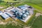 Aerial view on agro silos granary elevator with seeds cleaning line on agro-processing manufacturing plant for processing drying