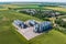 Aerial view on agro silos granary elevator with seeds cleaning line on agro-processing manufacturing plant for processing drying