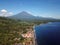 Aerial view of Agung volcano in Bali. In background mountain Abang and volcano Batur. Beatiful view to landscape with sea. Highest