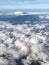 Aerial view of Agung volcano peak in Bali from plane window