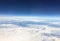 Aerial view from the airplane.Above the sky horizon.World explorer cover