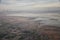 Aerial view from airplane of Antelope Island at sunset, view from Magna, sweeping cloudscape at sunrise with the Great Salt Lake