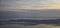 Aerial view from airplane of Antelope Island at sunset, view from Magna, sweeping cloudscape at sunrise with the Great Salt Lake