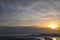 Aerial view from airplane of Antelope Island at sunset, view from Magna, sweeping cloudscape at sunrise with the Great Salt Lake