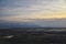 Aerial view from airplane of Antelope Island at sunset, view from Magna, sweeping cloudscape at sunrise with the Great Salt Lake