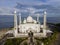 Aerial view of Al-Hakim Mosque. is a Taj Mahal-style mosque on the shores of Padang Beach, Padang City, West Sumatra, Indonesia.