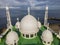 Aerial view of Al-Hakim Mosque. is a Taj Mahal-style mosque on the shores of Padang Beach, Padang City, West Sumatra, Indonesia.