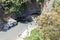 Aerial view Alcantara gorge with tourists exploring the ravine, Italy