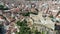 Aerial view of Almansa Castle, medieval fortification on stone hill surrounded by residential areas of city on sunny