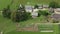 Aerial view of Alpine Valley with rustic farm in front