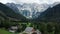 Aerial view of Alpine Valley with rustic farm in front