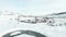 Aerial view. Altai. Winter. Flying over the snow-covered Siberian village. Aerial view