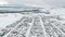 Aerial view. Altai. Winter. Flying over the snow-covered Siberian village. Aerial view