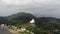 Aerial view of Amazing big buddha statue on Cam mountain Nui Cam and Van Linh pagoda, a destination travel for traveller, An