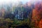 Aerial view on amazing foggy waterfall in Plitvice lakes