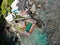 Aerial view of an amazing little surfer village on the rock cliff and coastline.