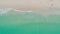 Aerial view amazing turquoise sea surface texture Beautiful tropical beach with white sand Top view empty and clean beach in Phuke
