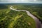 aerial view of the amazonas jungle, with winding rivers and dense greenery