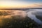 aerial view of the amazonas with misty morning light, sunrise or sunset