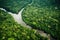 aerial view of the amazonas river, with lush green foliage in the background