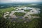 aerial view of the amazonas wilderness, with muddy waters and green vegetation