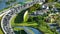 Aerial view of American apartment homes in Florida residential area near high speed highway junction. New family condos