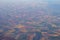 Aerial view of american countryside, farmland from the plane with green agriculture fields
