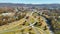 Aerial view of american freeway intersection in fall season in Asheville, North Carolina with fast moving cars and