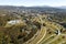 Aerial view of american freeway intersection in fall season in Asheville, North Carolina with fast moving cars and