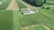 Aerial View of an Amish Farmland with an Amish One Room School House