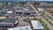 Aerial View of an Amish Mud Sale with Lots of Buggies and Farm Equipment