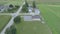 Aerial view of an amish one room school house on a summer day