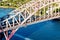 Aerial view of and Amtrak train crossing the Hell Gate Bridge in New York City