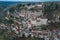 Aerial view of an ancient french village and its castle on cliff, Rocamadour at dusk