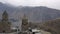 Aerial view ancient georgian church on highland on Kazbek mountain