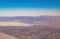 Aerial view of the Angeles National Forest mountain landscape and cityscape