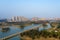 Aerial view of Anping Bridge  an ancient Song dynasty stone beam bridge in Fujian province with city skyline at dusk