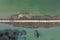 Aerial view of Anping Bridge an ancient Song dynasty stone beam bridge in Fujian province with city skyline at dusk