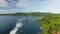 Aerial view of Anse Royale coast with clear sea water of Indian Ocean and green luxuriant hills of Mahe Island, Seychelles, 4k UHD