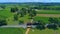 Aerial View of an Antique Steam Engine and Caboose Steaming and Puffing