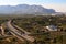 Aerial view of the AP7 motorway near Denia with mountains in the background.