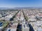 Aerial View with Apartments, Houses and Condos toward Hollywood Sign Mountain over Koreatown LA Los Angeles