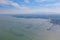 Aerial view of aquaculture nets for fish farm in a lake in Sri Racha, Chonburi, Thailand. tropical beach, Andaman sea, bay island