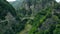 Aerial view of the arched bridge connecting a mountain road in the Romanian Carpathian\'s