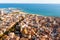 Aerial view of Arenys de Mar on Mediterranean coast with parish church, Spain